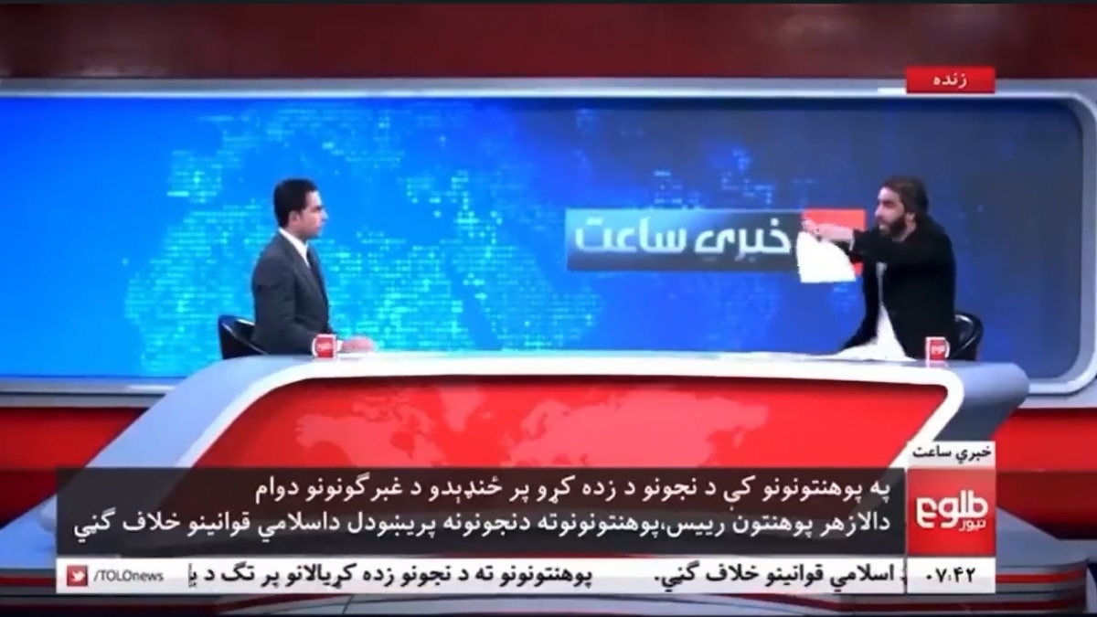 'Teach Everyone Or No One': Afghan Men Join In Protests Against Taliban's Ban On Women's Education